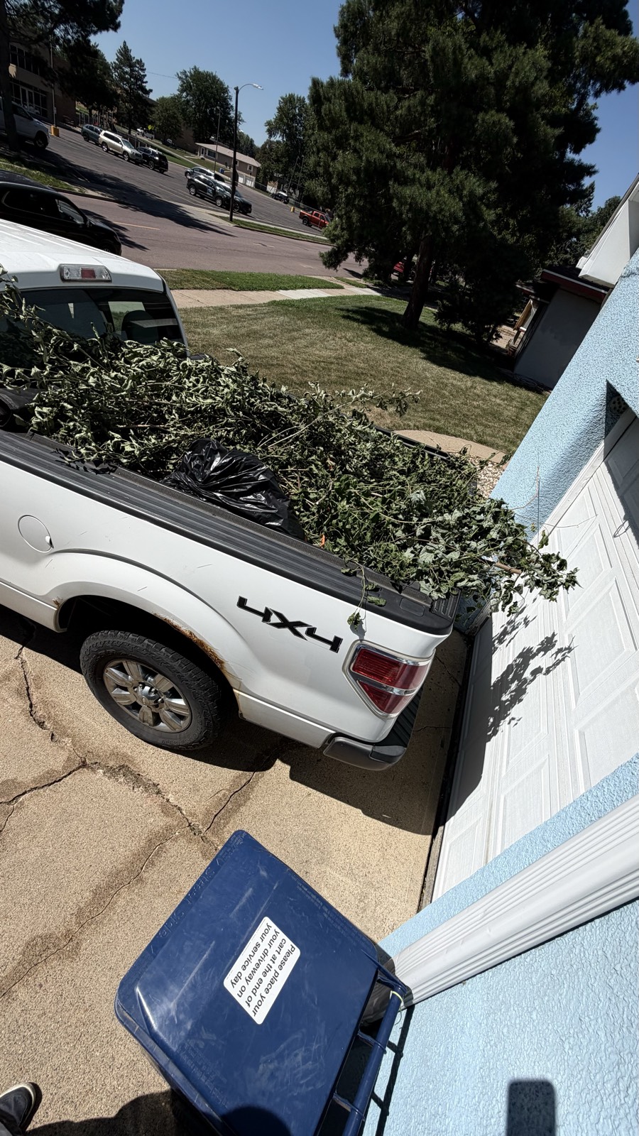 Truck loaded with brush — Consider It Done, Sioux Falls