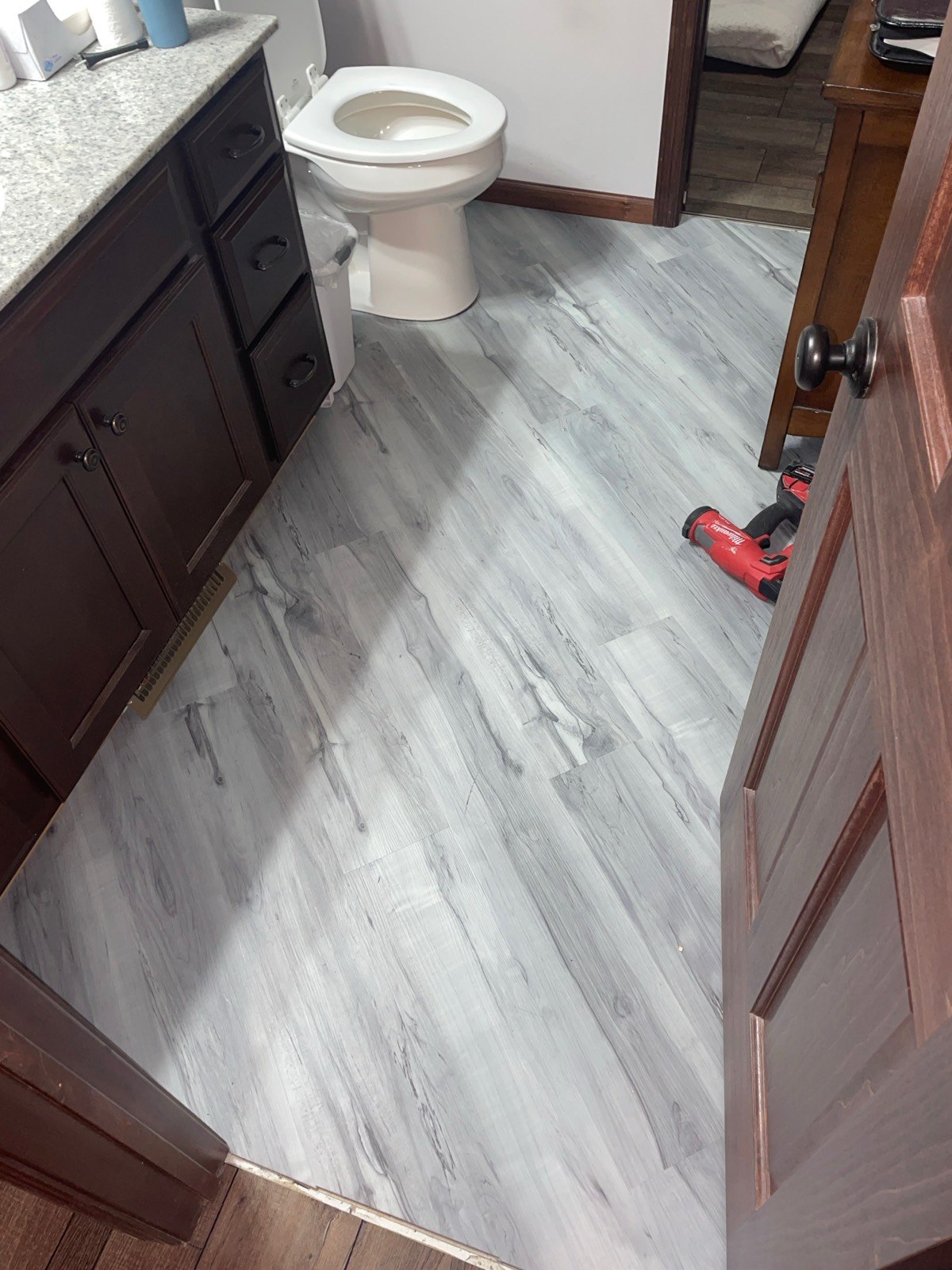 Bathroom vanity and flooring — Consider It Done, Sioux Falls